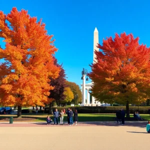 People enjoying the fall weather in Washington D.C. with colorful trees and blue sky.